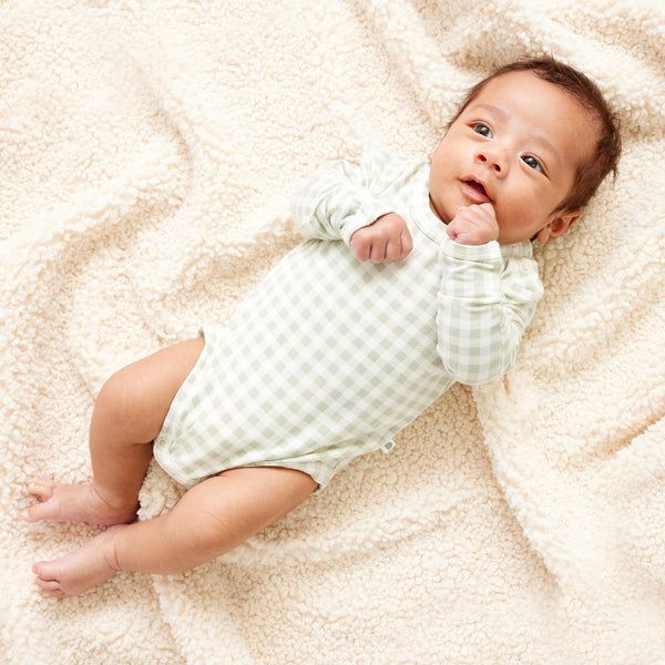 Side fastening hotsell baby bodysuits